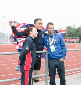 British gold medal winners Mickaela Richards and Kushal Limbu pose with a friend