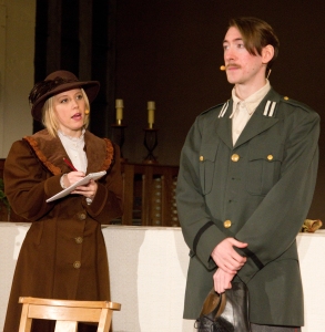 Natalie Taylor-Scotcher as the narrator talking to Albert Kiekert, played by James Le Lacheur